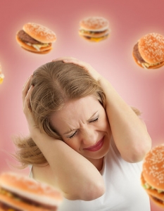 Жена, обладана от духа на хамбургерите от миналото
Shutterstock